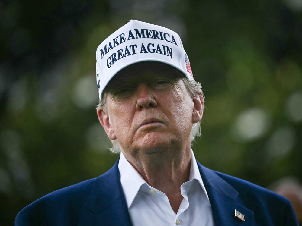 US President Donald Trump speaks to the press on the South Lawn of the White House in Washington, DC on June 18, 2025. President Trump left the question of whether the United States will join Israeli strikes on Iran up in the air.