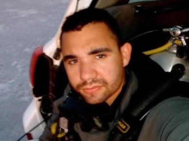 Navy Diver Matt Kelly in Salalah, Oman circa 2010 before doing an underwater sweep of a pier to look for improvised explosive devices.<br>