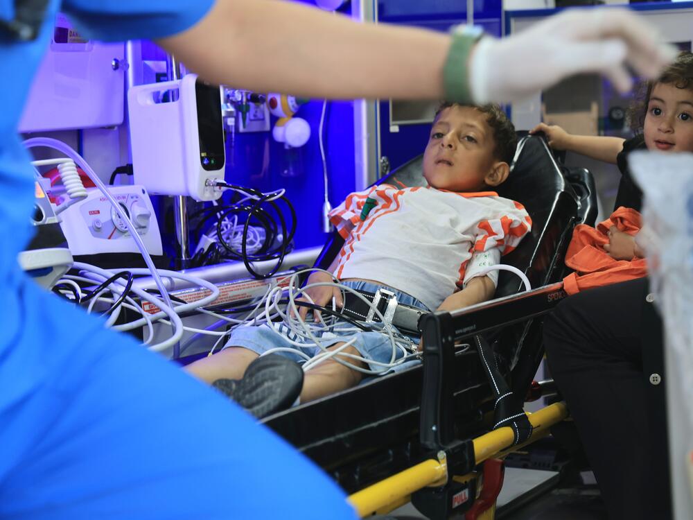 Pediatric patients evacuated from Gaza arrive for treatment at King Hussein Medical City in Amman on June 11.