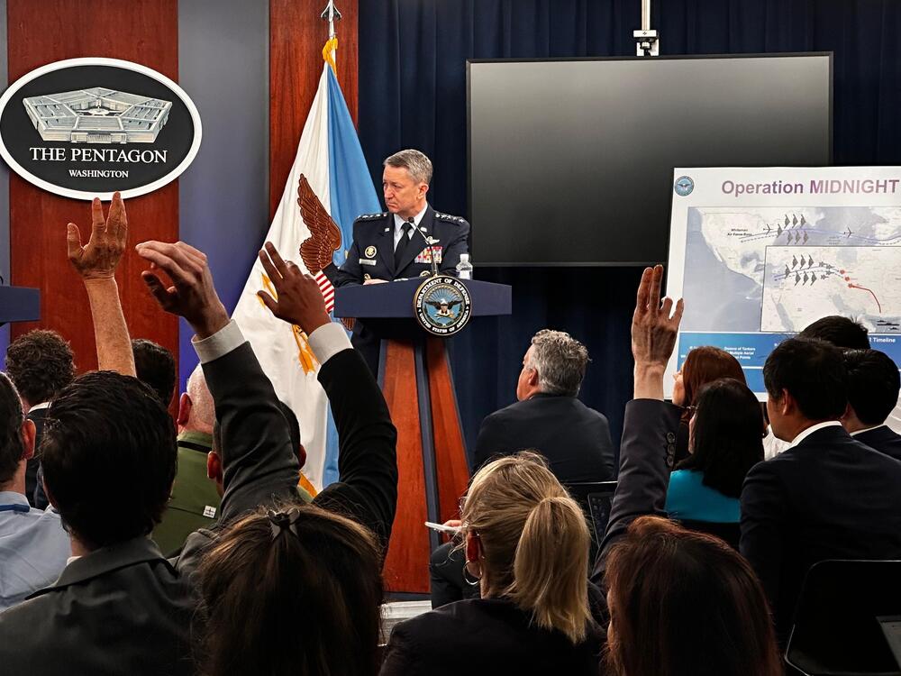 Secretary of Defense Pete Hegseth (L) and Gen. Dan Caine, chairman of the Joint Chiefs of Staff, (R) attend press conference at Pentagon June 22.