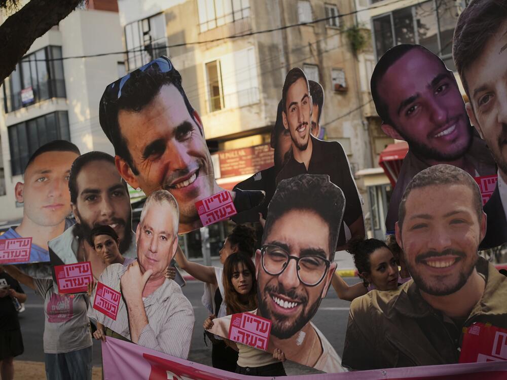 Relatives and supporters of Israeli hostages held by Hamas in Gaza display photos of the captives during a protest demanding their release. in Tel Aviv, Israel, on Saturday, June 21, 2025.
