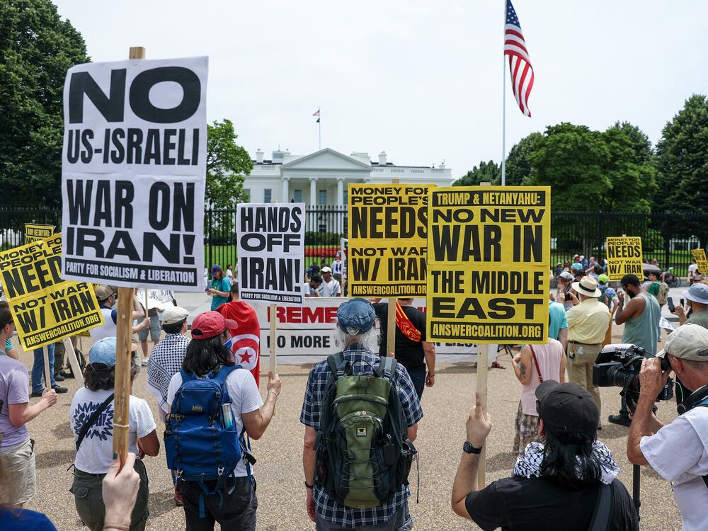 Demonstrators gather outside the White House on Sunday for a rally opposing the U.S. strikes on Iran nuclear sites.