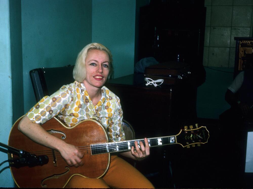 Bassist Carol Kaye plays an Epiphone hollowbody electric guitar in April 1966 in Los Angeles, California.