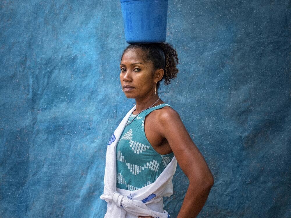 A portrait of Sylvia Suzanie Razanparana. When she first suffered symptoms from female genital schistosomiasis, which resemble the symptoms of sexually transmitted diseases, her husband accused her of betraying him and left her.