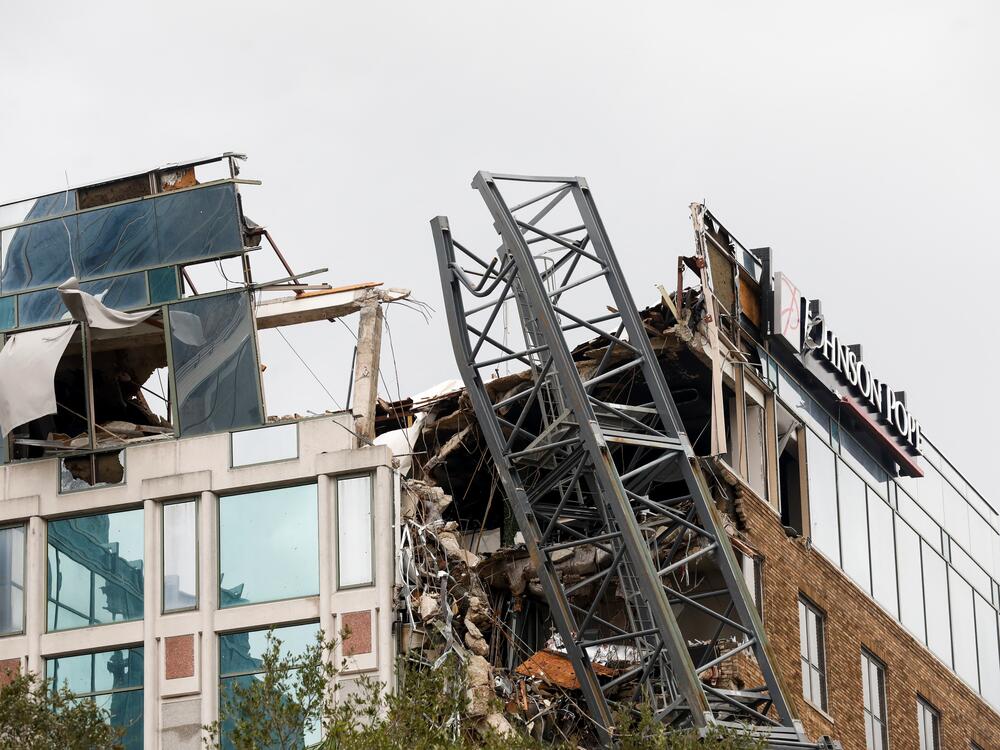 A view shows a collapsed construction crane that fell on the building that also hosts the offices of the Tampa Bay Times, after Hurricane Milton made landfall, in downtown St. Petersburg, Fla., on Thursday.
