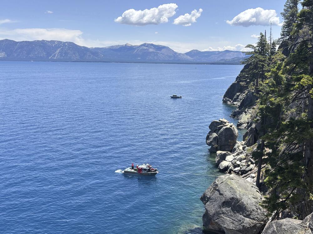 Authorities conduct searches along the shore at D.L. Bliss State Park after a weekend incident in which a boat capsized, killing several people, on Monday, June 23, 2025, in South Lake Tahoe, Calif.
