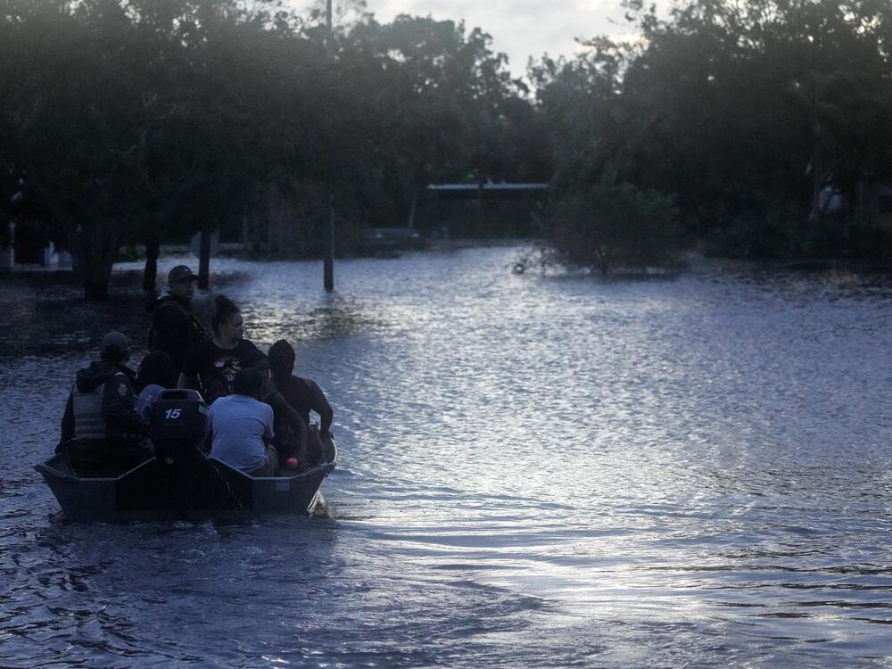 Residents are rescued from an apartment complex in Clearwater that was flooded from and overflowing creek due to Hurricane Milton in Florida. Hurricane Milton felled trees, tore roofs off buildings, and flooded streets, leaving residents of the Florida coast surveying a trail of destruction on October 10, 2024, in a state still reeling from another massive storm two weeks earlier.