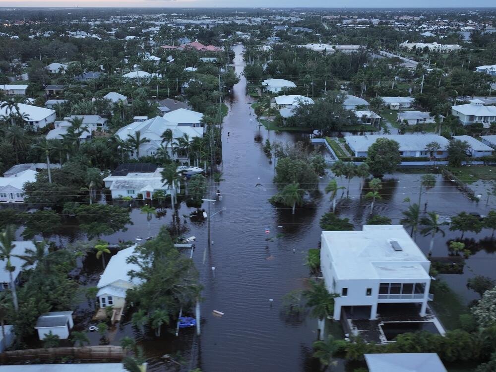 In this aerial view, Flood waters inundate a neighborhood after Hurricane Milton came ashore on October 10, 2024, in Punta Gorda, Florida. The storm made landfall as a Category 3 hurricane in the Siesta Key area of Florida, causing damage and flooding throughout Central Florida.