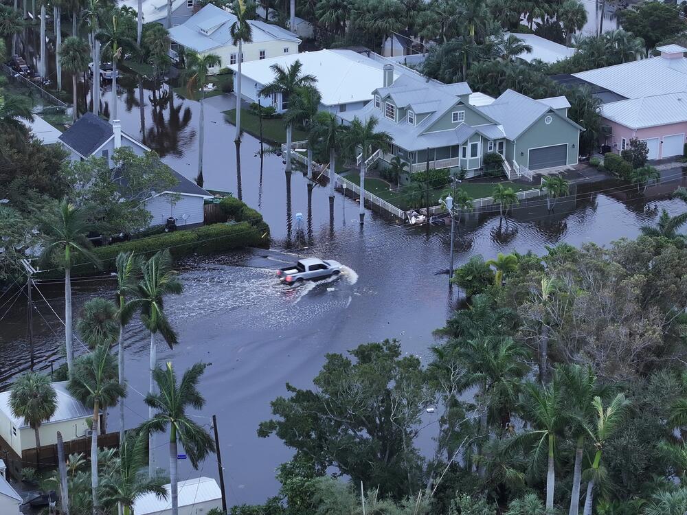 In this aerial view, Flood waters inundate a neighborhood after Hurricane Milton came ashore in Punta Gorda, Florida. The storm made landfall as a Category 3 hurricane in the Siesta Key area of Florida, causing damage and flooding throughout Central Florida.