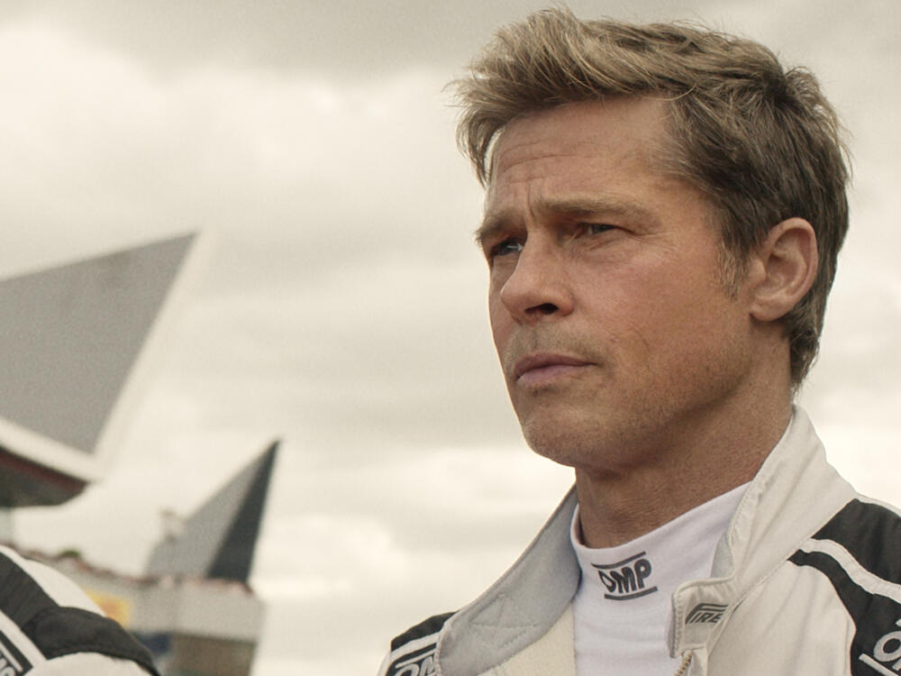 Damson Idris and Brad Pitt in <em>F1 The Movie</em>.