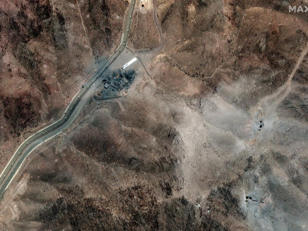 A satellite image of Iran's Fordo nuclear site shows clusters of new craters likely caused by U.S. bunker buster bombs dropped over the weekend following orders by President Trump.