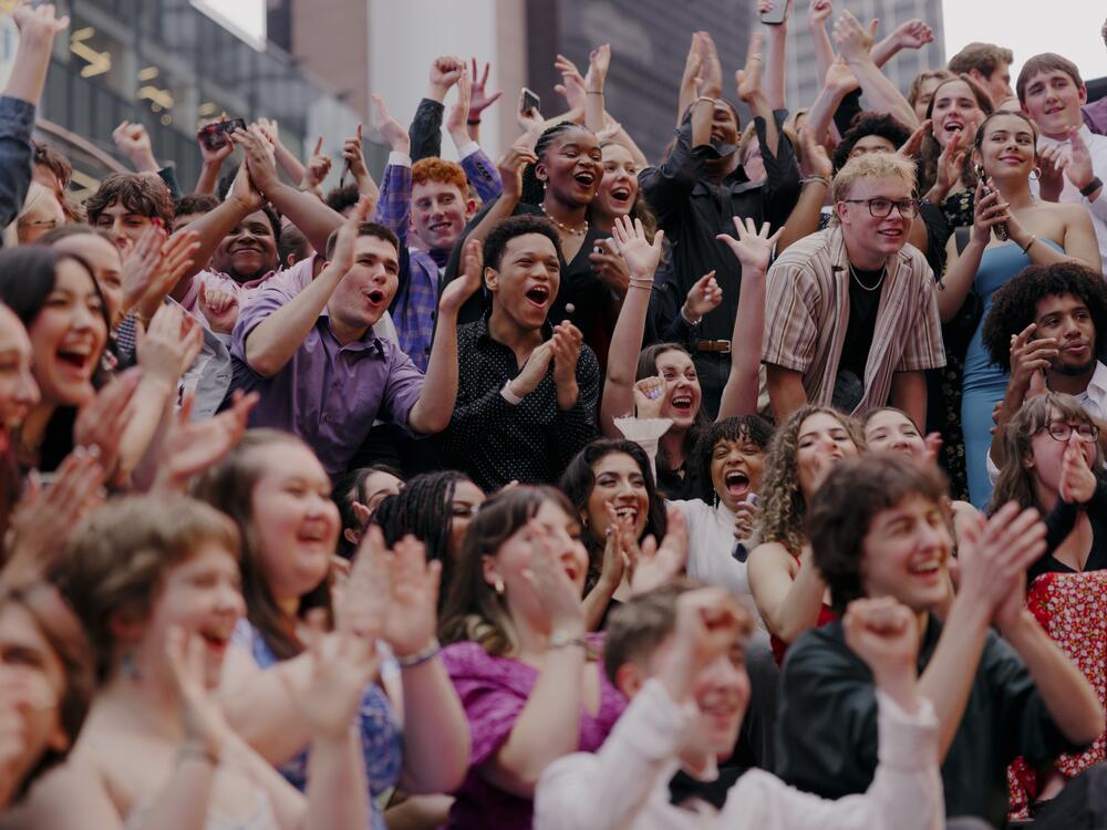 The Jimmy Award nominees cheered for a group photograph.