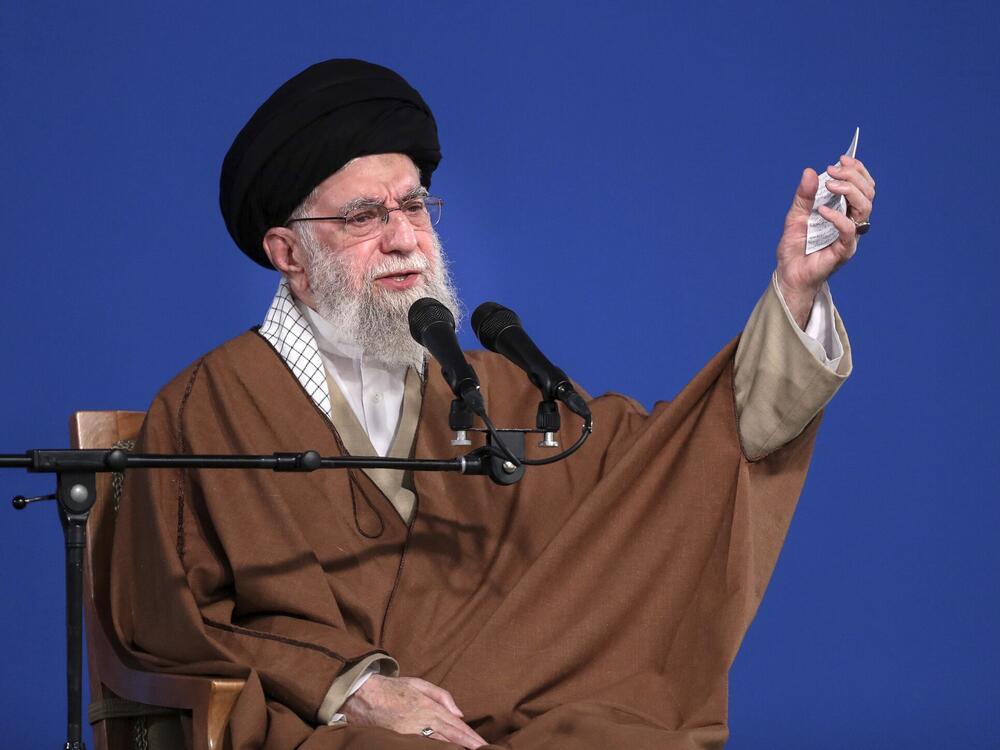 In this photo released by the official website of the office of the Iranian supreme leader, Supreme Leader Ayatollah Ali Khamenei speaks to a group of people and officials in Tehran, Iran, Friday, March 21, 2025.