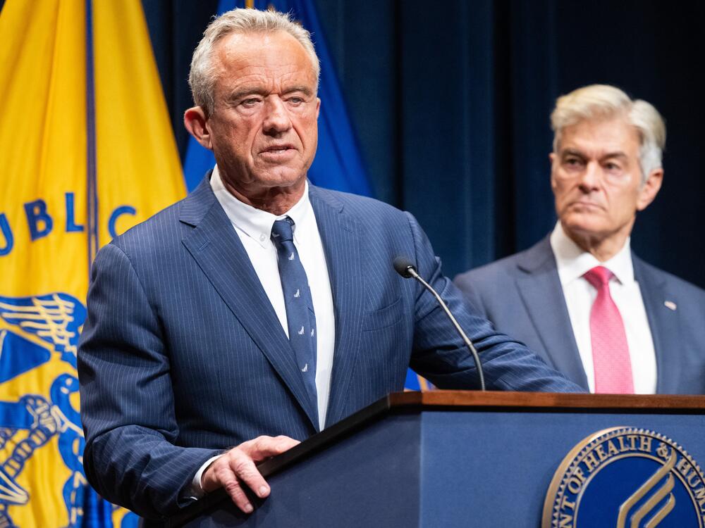 Secretary of Health and Human Services Robert F. Kennedy Jr. addresses reporters on Monday as Medicare and Medicaid Administrator Dr. Mehmet Oz, right, listens.