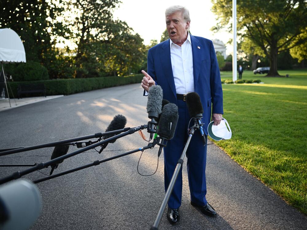 President Trump speaks to reporters before boarding Marine One from the South Lawn of the White House in Washington, D.C., on Tuesday.