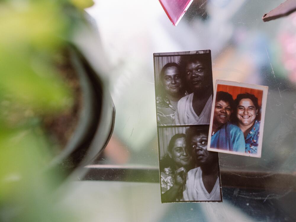 Older images of Cindy and Jo sit on their side table in the living room of their home in Blythe, Calif.