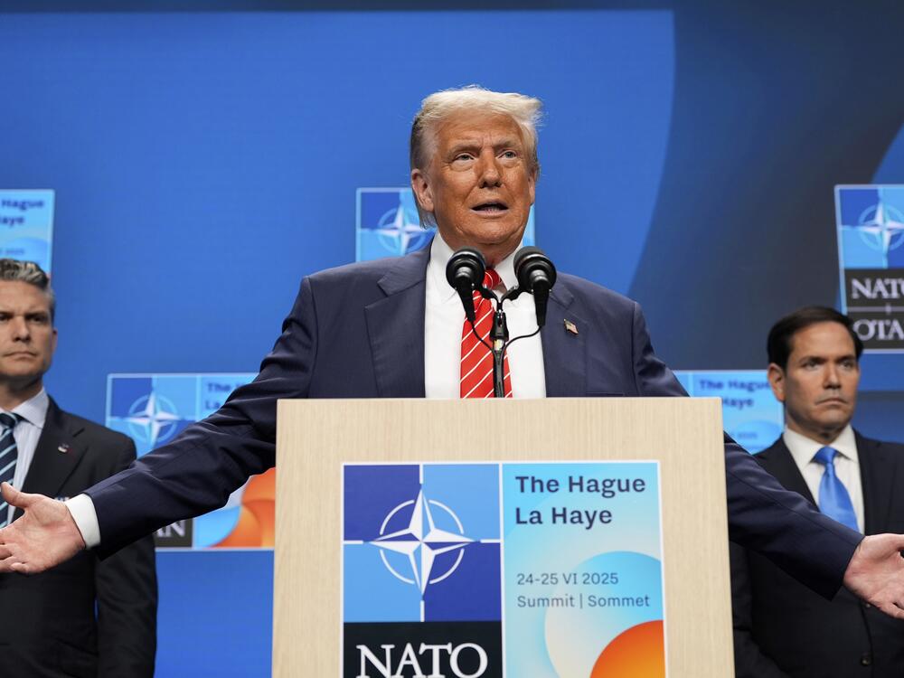 President Donald Trump speaks during a media conference at the end of the NATO summit as Secretary of State Marco Rubio, right, and Defense Secretary Pete Hegseth listen, in The Hague, Netherlands, Wednesday, June 25, 2025.