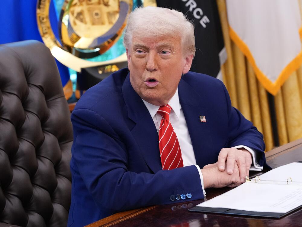 President Trump speaks to reporters in the Oval Office of the White House on May 30.