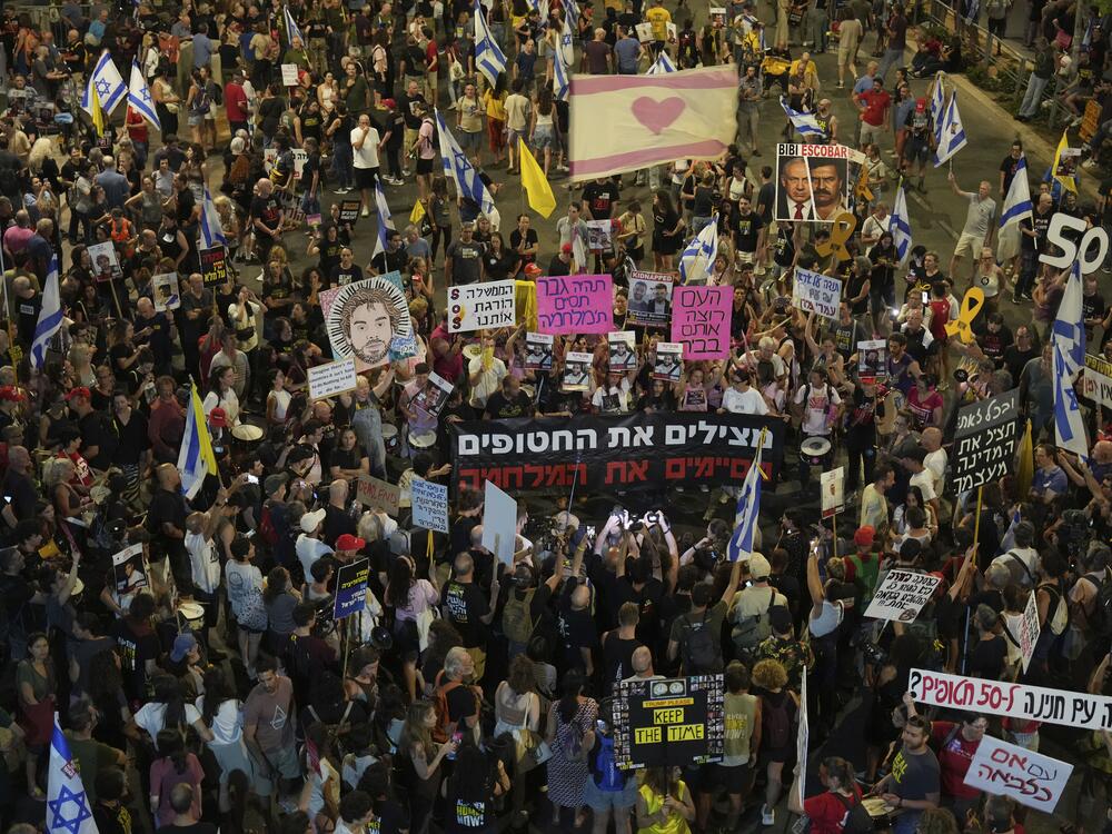People take part in a protest demanding the end of the war and immediate release of hostages held by Hamas in the Gaza Strip, and against Prime Minister Benjamin Netanyahu's government in Tel Aviv, Israel, Saturday.
