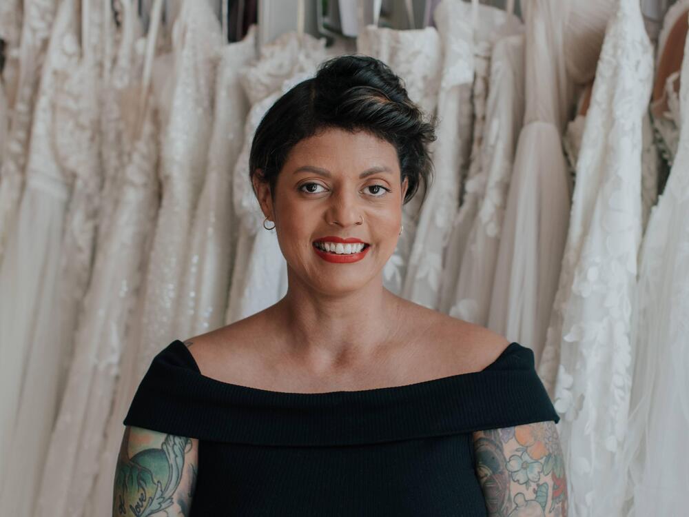 Christine Greenberg sells wedding gowns at Urban Set Bride in Richmond, Va.