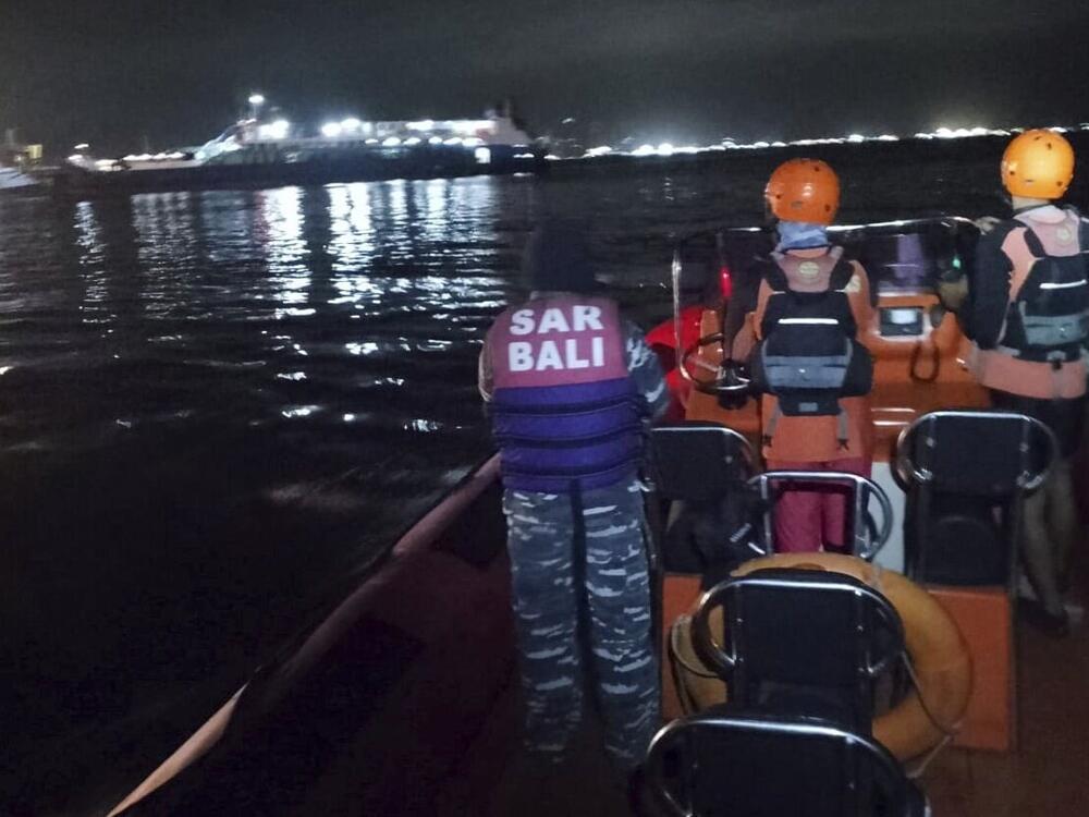 In this photo released by the Indonesian National Search and Rescue Agency (BASARNAS) rescuers search for victims after a ferry enroute for the resort island of Bali sank off Ketapang, East Java, Indonesia on Thursday.