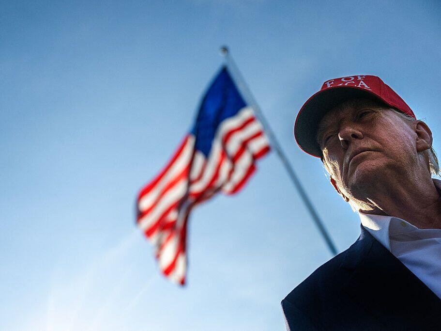 President Trump talks to members of the press as he departs from the South Lawn of the White House on Tuesday.