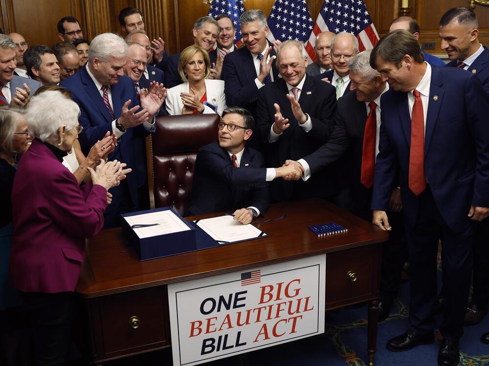 Speaker Johnson shakes hands with fellow House Republicans during an enrollment ceremony following final passage on Thursday.