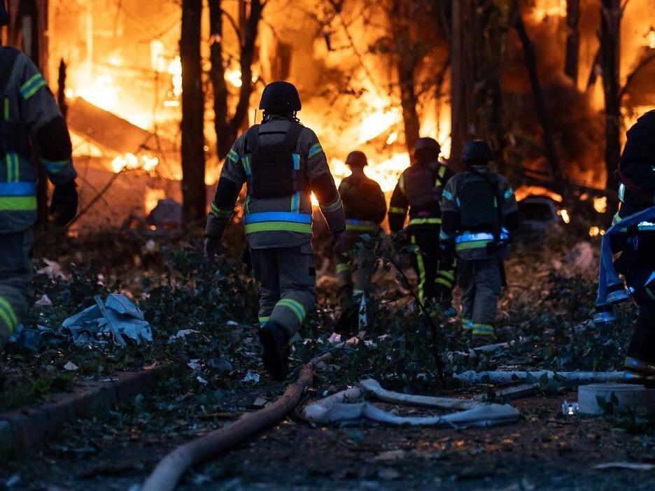 Firefighters battle against the fire broke out after Russian airstrike in Kyiv, Ukraine.