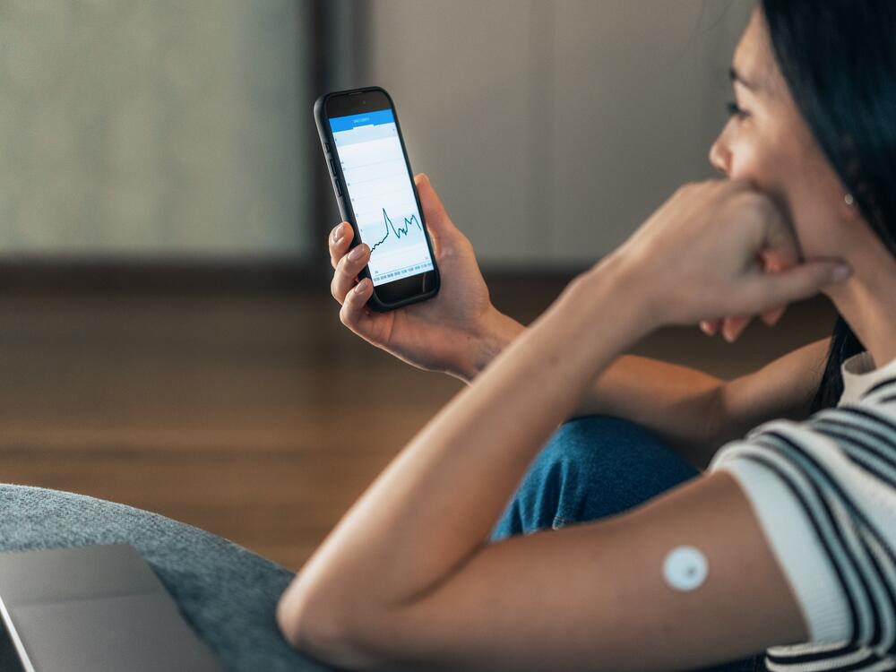 A continuous glucose monitor helps people track their blood sugar spikes and dips.