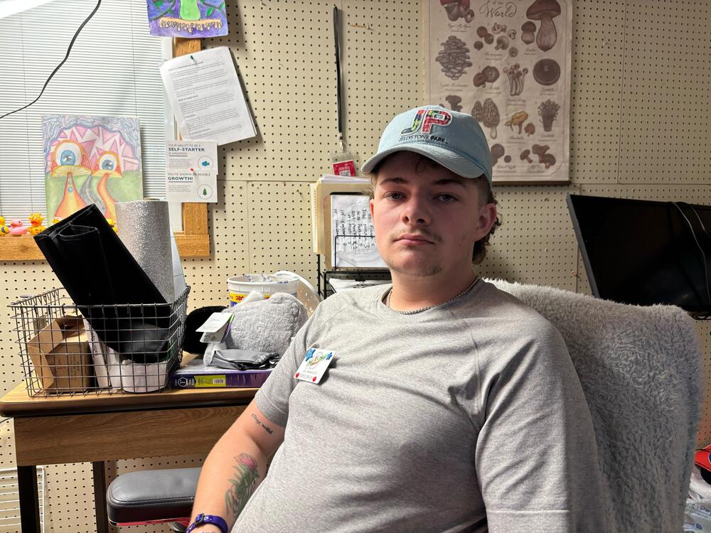 Taylor Bergmann poses for a portrait in his office in Yogi Bear's Jellystone Park in Kerrville, Texas on July 8, 2025.