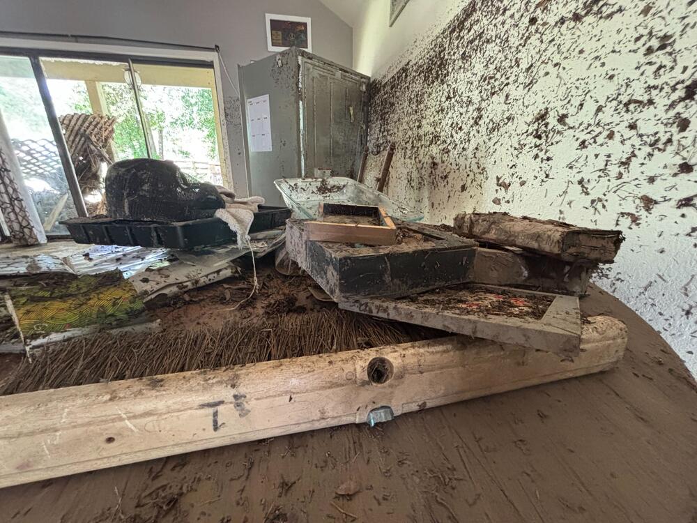 Flood damage at the house were Taylor Bergmann lived. The water line was at least five feet tall.