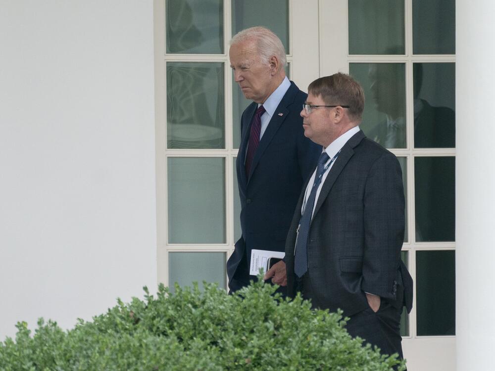 Former President Joe Biden walks with his White House physician, Kevin O'Connor, outside the White House on Aug. 28, 2023. O'Connor declined to testify Wednesday as part of an investigation by Republicans on the House Oversight Committee into Biden's mental fitness.