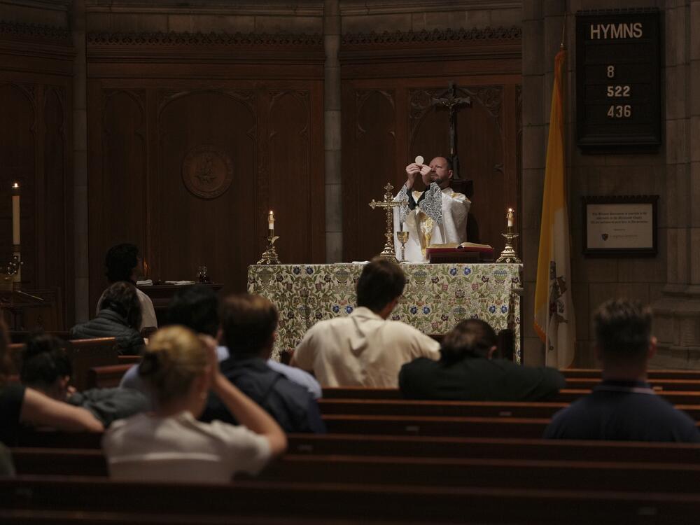 A priest during a Mass in New Jersey. Catholic leaders say Mass attendance has dropped as as result of the Trump administration's immigration actions.