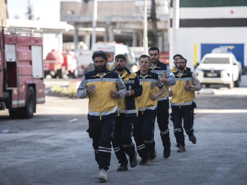 The White Helmets exercise outside the firehouse.