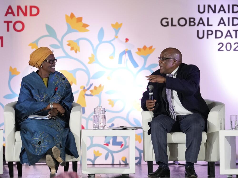 South Africa's Minister of Health Aaron Motsoaledi, right, speaks as Winnie Byanyima, executive director of UNAIDS, watches during the release of the UNAIDS report at Bertha Gxowa Hospital in Germiston, South Africa,