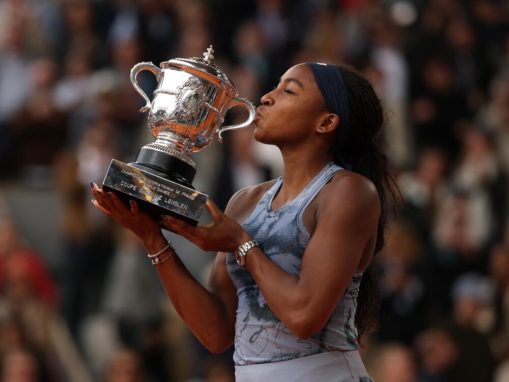 Coco Gauff of the U.S. kisses her trophy after winning the women's singles at the 2025 French Open in June.