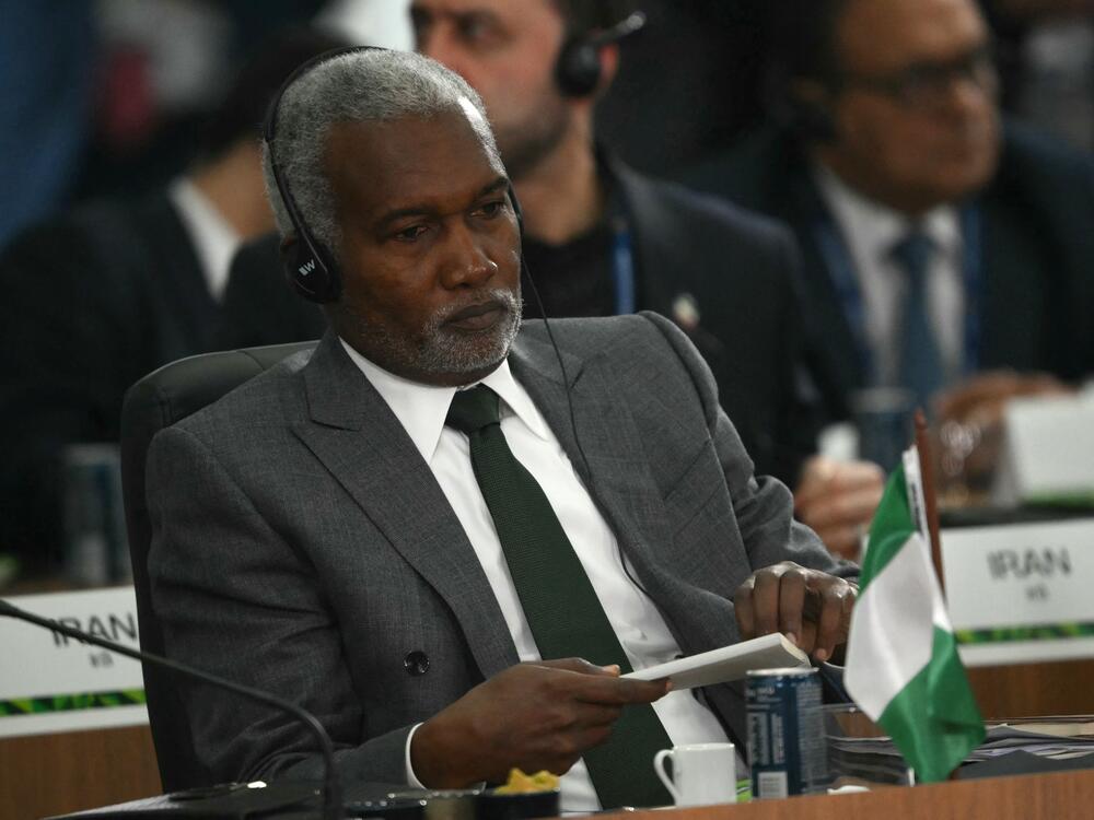 Nigeria's government is pushing back against U.S. efforts to send the country migrants and foreign prisoners, with Nigerian Foreign Minister Yusuf Tuggar, seen here at a summit in Brazil this year, quoting Public Enemy to drive home his point.