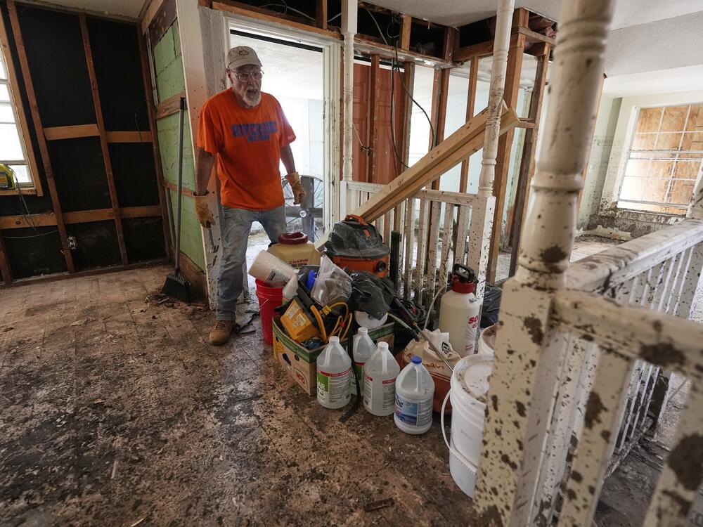 Homeowner Daniel Olivas walks through his home that was heavily damaged from flash floods along the Guadalupe River in Kerrville, Texas, on Thursday, July 10, 2025. Many home buyers in the U.S. do not get information about flood risk before them move in.