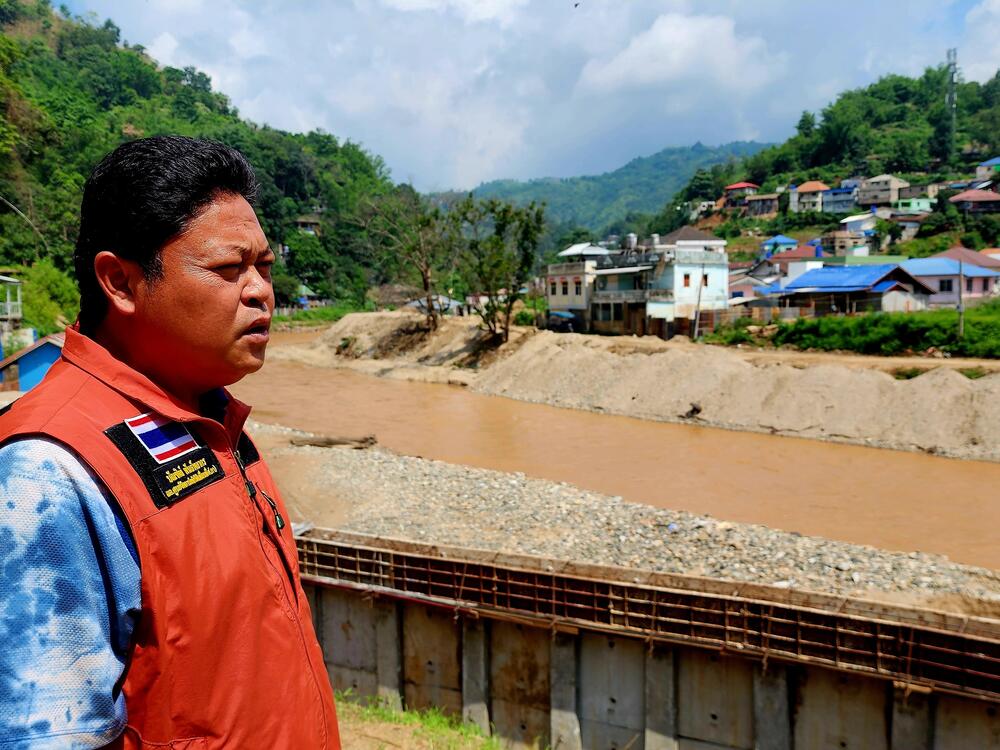 Bundit Pantarakon, a local businessman and city council member in Mae Sai, Thailand, looks over the Sai River.