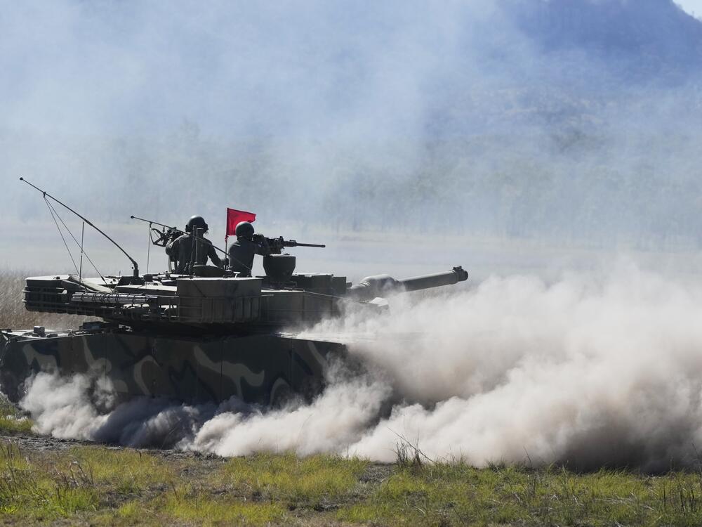 South Korean soldiers fire from a K1 tank during Exercise Talisman Sabre 2025, Australia's largest-ever war fighting drills at Shoalwater Bay Training Area, near Rockhampton, Australia, on Monday.