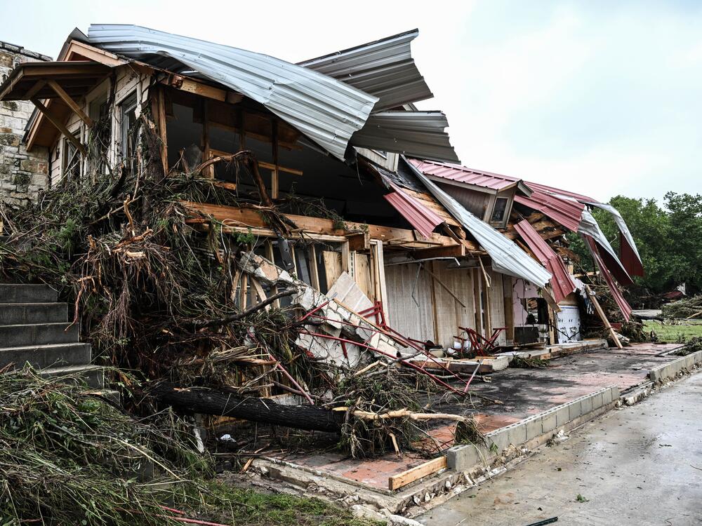 A damaged home is seen after flash flooding in Hunt, Texas, on July 4. Just 4% of homeowners nationwide have flood insurance, according to the Federal Emergency Management Agency.