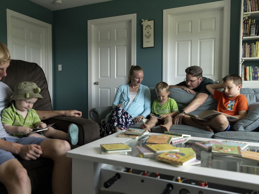 Megan and Stephen Alger, photographed at home with their children in Augusta, Georgia. They have eight children and are expecting their ninth in December.