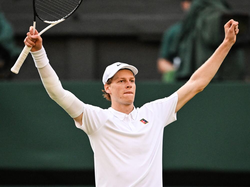 Italy's Jannik Sinner celebrates after victory against Spain's Carlos Alcaraz at Wimbledon, southwest London, on Sunday.