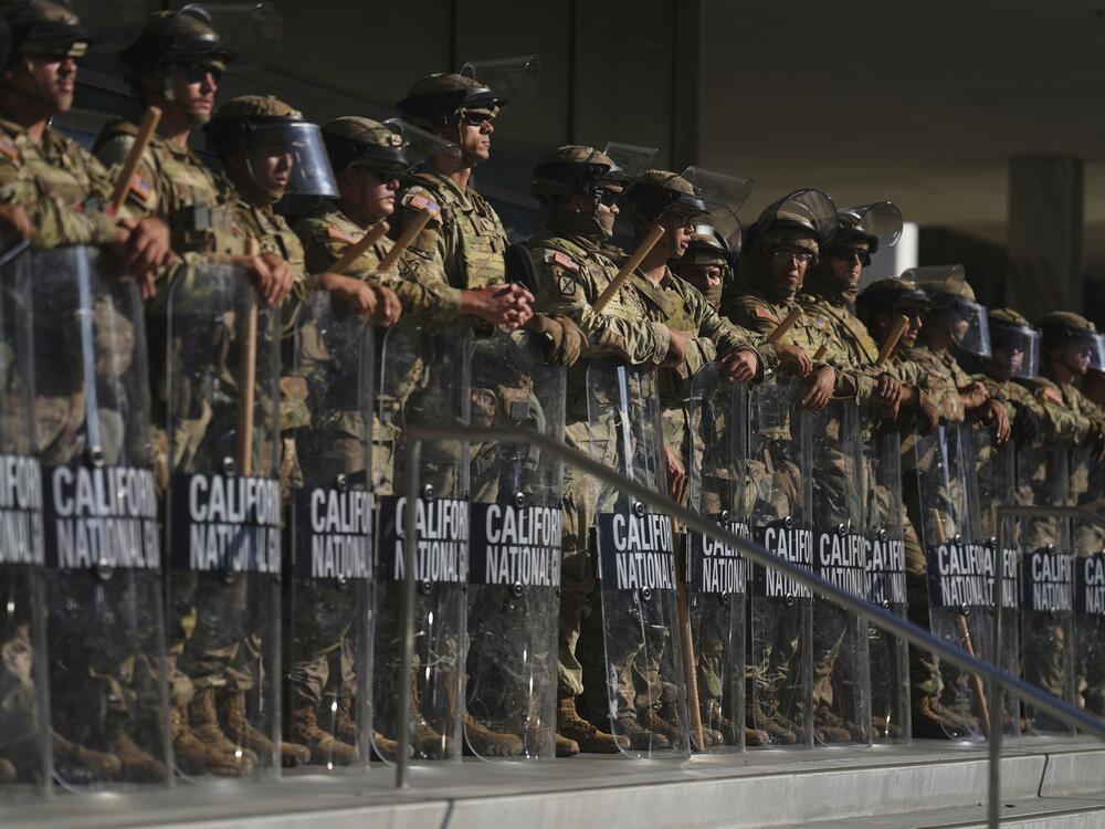 FILE - California National Guard are positioned at the Federal Building, June 10, 2025, in downtown Los Angeles.