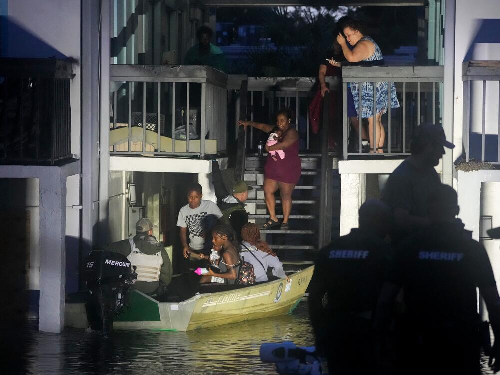Residents are rescued from an their second story apartment complex in Clearwater that was flooded from and overflowing creek due to Hurricane Milton  in Florida. Hurricane Milton felled trees, tore roofs off buildings, and flooded streets, leaving residents of the Florida coast surveying a trail of destruction in a state still reeling from another massive storm two weeks earlier.