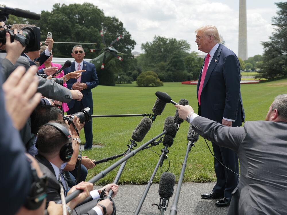 President Trump speaks to the media as he departs the White House on Tuesday for Pittsburgh.