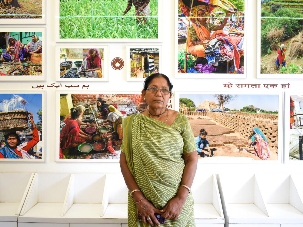 Laxmiben Nadia earns her living by collecting plastic and metal from trash dumps to sell to scrap dealers. Last summer, she collapsed while working during extreme heat and needed a week to recover. She benefited from a program administered by the Self Employed Women's Association, a trade union, offering cash payouts to workers who stay home when temperatures hit a certain threshold. Above: Nadia visits the union's offices.
