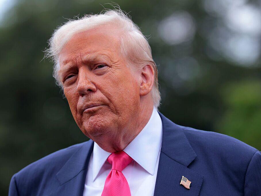 President Donald Trump speaks to the media as he departs the White House on Tuesday.