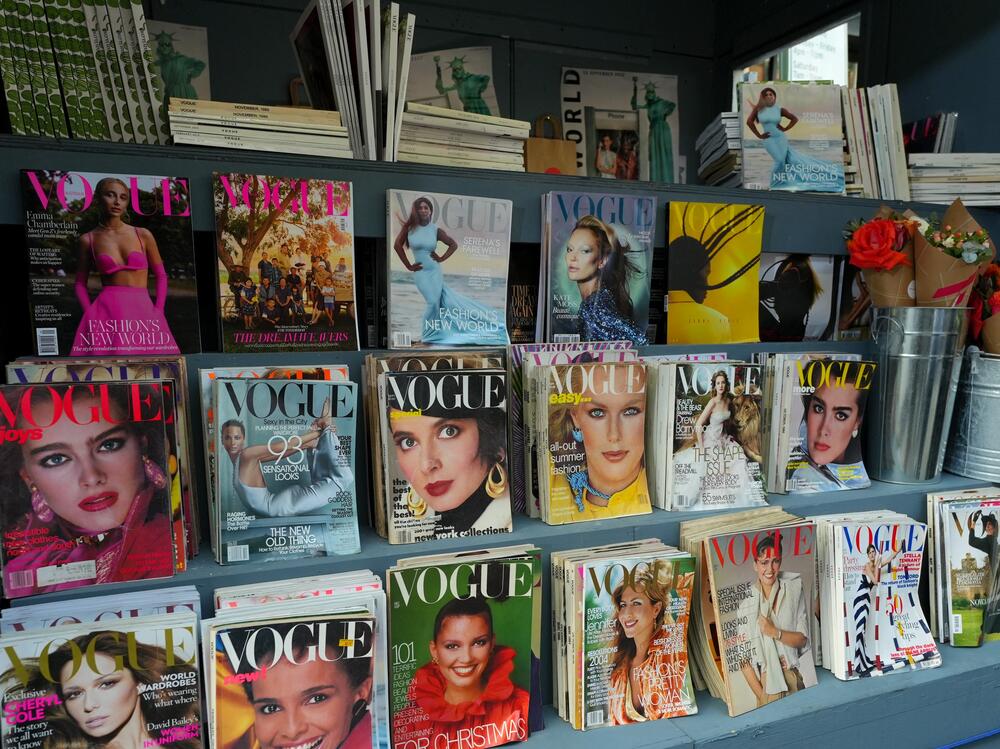 In <em>Empire of the Elite,</em> Michael Grynbaum tracks Condé Nast's decades of cultural dominance up through its decline today. Above, Vogue magazines at a newsstand during VOGUE World: New York in 2022.