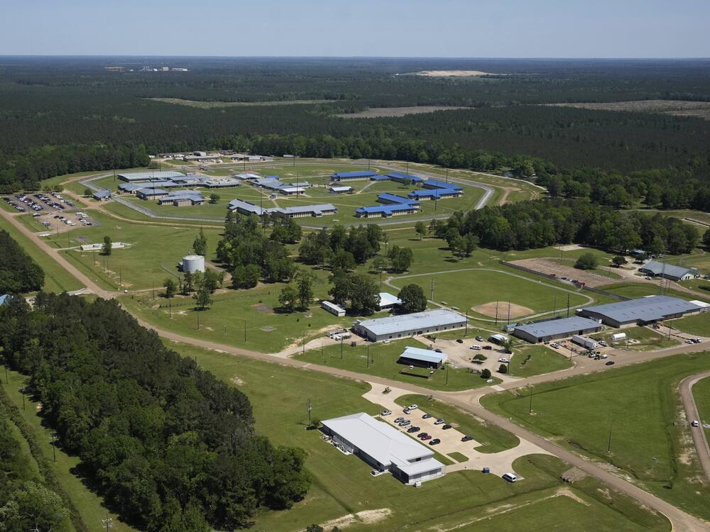 The EOIR (Executive Office For Immigration Review) Oakdale Immigration Court, bottom, is seen in this aerial photo from April in Oakdale, La.